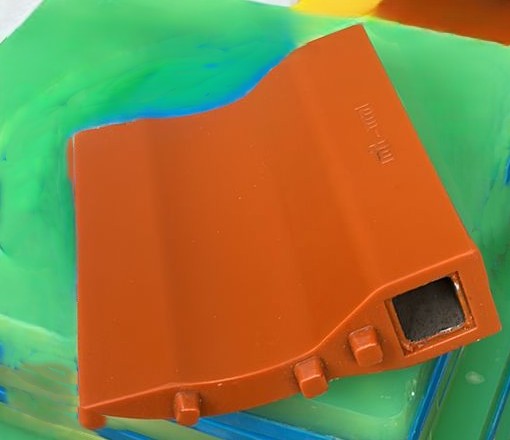 Polyurethane Spacer Blocks with Embedded Metal Inserts (Possibly for Industrial Clamping or Structural Positioning Applications)